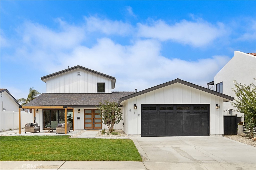 Nestled in the coveted Pacifica neighborhood of San Clemente, this meticulously remodeled 4-bedroom, 3-bathroom residence offers 2,312 sq ft of refined coastal living on an expansive 8,241 sq ft lot. Unfolding before you are sweeping 180° ocean and city vistas—visible from the kitchen, primary suite shower, private balcony, and backyard—just minutes from Calafia and T-Street Beaches, acclaimed dining, scenic parks, and prime whale-watching locales.
Step inside to discover an open-concept layout illuminated by new windows and sliding doors that frame endless blue horizons. Underfoot, designer porcelain tile and wide-plank flooring flow seamlessly between entertaining areas, while recessed lighting and Mitzi pendants cast a warm glow. Dual en-suite bedrooms—one on each level—provide flexible living arrangements perfect for guests, home office, or multigenerational needs.
At the heart of the home, the chef’s kitchen is a true centerpiece. Custom inset cabinetry anchors Dolomite natural stone countertops and an oversized island, while a porcelain backsplash from Bedrosians adds texture and depth. High-end stainless-steel appliances stand ready for culinary creations, complemented by polished chrome hardware from Pottery Barn and an elegant chandelier overhead. A walk-in pantry and built-in display shelving ensure both style and storage.
Retreat to the primary suite—a serene sanctuary showcasing panoramic ocean views from its private balcony. The attached spa-inspired bath features a wet room clad in Bedrosians Wave Ice Honed Porcelain tile, Signature Hardware fixtures, and a solid oak vanity topped with white quartz. In the guest bath, makings of a luxury hotel welcome visitors with Makoto Matte Ceramic tile walls and coordinated finishes.
Designed for effortless indoor-outdoor living, the grounds are an entertainer’s dream. A brand-new Mangaris wood deck with steel cable railing overlooks lush landscaping and the Pacific beyond. The smooth stucco exterior, fresh roof, and drought-tolerant plantings add curb appeal and low maintenance. Inside, the fully finished two-car garage—with epoxy flooring and built-in cabinetry—provides both workshop space and storage.
Blending colonial-inspired architecture with modern coastal elegance, this San Clemente jewel delivers turnkey luxury in one of South Orange County’s most sought-after enclaves. Don’t miss the opportunity to call this panoramic ocean-view retreat your next home.