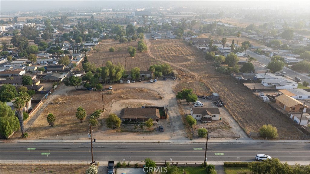 Great opportunity to own a 6-unit property in the City of Moreno Valley. The property is well-located, just minutes from Costco, WinCo Foods, Target, Moreno Valley Mall, multiple schools, and in close proximity to the 215 and 60 freeways. It offers four separate entrances for convenient access. The unit mix includes three separate structures: a single-family home, a duplex, and a triplex. Additionally, there is one more unit on the property that requires a complete renovation or rebuild due to its current condition. The total lot size is approximately 5.95 acres across multiple parcels, potentially allowing for the development of additional units. Buyers are encouraged to verify the maximum number of allowable units that can be built on site.