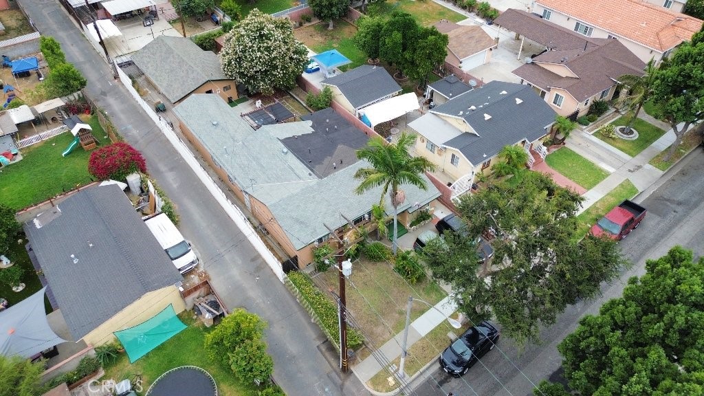 Endless Potential in South Gate! This 5-bedroom, 2-bath home offers 2,185 sq ft of living space on a spacious 7,314 sq ft lot perfect for a growing family or multi-generational living. With a detached garage and generous backyard, it’s a great opportunity to build an ADU or create a two-family setup. The open floor plan provides a great foundation, and with a little TLC, you can make it truly your own. Conveniently located near shopping, schools, and public transit in a quiet, established neighborhood. A perfect starter home or investment with room to grow!