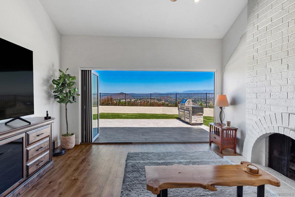 Welcome to the good life in Rancho Bernardo where stunning design meets everyday comfort. From the moment you step inside, this home makes an unforgettable impression. Thoughtfully remodeled with designer finishes, the details showcase the sweeping views and effortless flow of indoor/outdoor living. Two full Panoramic Doors, one off the family room and another from the versatile office/den/workout room, create seamless transitions to the outdoors, filling the home with natural light and fresh breezes. The open-concept layout is turnkey and sophisticated, ready to impress even the most discerning buyers. The main level offers the convenience of both primary and secondary ensuite bedrooms, along with a chef’s kitchen designed to delight—oversized, elegant, and built for both entertaining and everyday ease. Upstairs, discover another bedroom and bath plus a flexible loft space perfect for an office, game room, fitness studio, or creative retreat. The backyard is a private haven with fruit trees, herb plantings, synthetic turf, a BBQ, and room for a pool. Low maintenance, high enjoyment—a perfect setting for gatherings with friends and family. Practical perks include low HOA fees, no Mello-Roos, and top-rated Poway Unified schools. Residents also enjoy access to the Bernardo Heights Community Center with resort-style amenities: fitness center, two pools, jacuzzi, tennis and pickleball courts, basketball hoops, BBQs, billiards, and more. This is not simply a home—it’s a sanctuary you’ll be excited to come back to (assuming you ever leave). Come live the good life! Current owner has done the following during ownership: 1) new roof in 2021 2) new stainless steel Samsung washer and dryer, as well as refrigerator in 2021 3) added a water softener 4) epoxy flooring in the garage 5) multiple fruit trees and herb plants.
