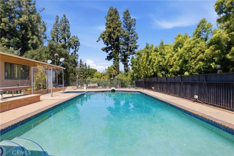 Photo of 4908 Calvin Avenue, Tarzana, CA 91356 (MLS # SR26194736)
