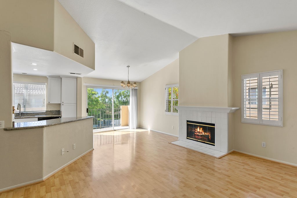 Experience elevated living in this beautifully updated 2 bed, 2 bath townhouse, perfectly situated in the highly sought-after Encore community in Marina Hills. Soaring vaulted ceilings and expansive windows fill the home with natural light while showcasing serene hillside views.
The spacious living room centers around a dramatic grand fireplace, flowing seamlessly into the open-concept kitchen and dining area—perfect for entertaining. The remodeled kitchen features white shaker soft-close cabinets, quartz countertops, a chic tile backsplash, recessed lighting, and a peninsula with bar seating. Step through the sliding glass doors to a sun-drenched balcony with a partial hillside view.
Both bathrooms have been tastefully remodeled with modern vanities, sleek fixtures, and contemporary finishes. The bright and airy bedrooms feature large windows and sliding doors to a second, more expansive balcony.
Additional highlights include a deep 2-car garage with in-unit laundry hookups and ample storage space.
Residents enjoy exclusive access to Marina Hills' top-tier amenities, including an Olympic-size pool, spa, clubhouse, BBQ areas, tennis and pickleball courts, scenic parks, playgrounds, and more!