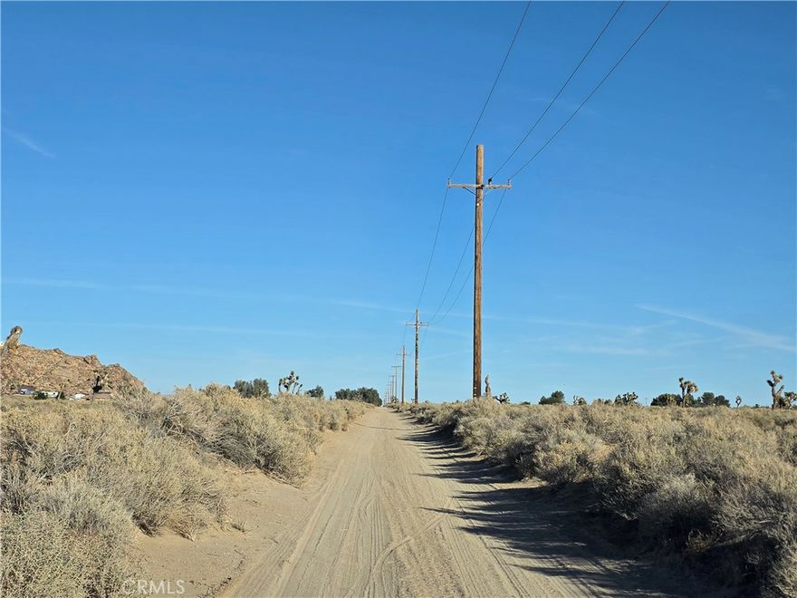 Discover 4.20 acres of opportunity in Lucerne Valley! This spacious parcel offers power access and a convenient location just minutes from the center of town and Highway 18. Enjoy the freedom to create your own desert retreat, build your dream home, or hold as a long-term investment. The flat terrain and easy access make this property ideal for those looking for both space and convenience. Whether you’re planning a homestead, workshop, or future development, this lot gives you room to grow and dream big. Take advantage of the chance to own a well-located piece of the High Desert—properties like this don’t last long! Drive by and check it out before someone else does! APN: 0451-541-04-0000. Latitude:34.443175, Longitude:-116.995063.