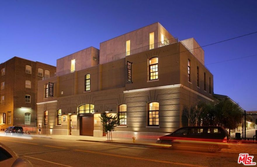 Iconic 940 E. 2nd Street (aka "Barn Lofts") set the standard for elegant loft living in the Arts District.  The unique design of this town home-style loft on 3 floors set a standard that has yet to be matched.  Originally built in 1906 as a sugar beet railroad warehouse, 940 was re-imagined by award-winning architect Rocky Rockefeller and was transformed into stunning, light-filled lofts combining the best of the rustic, industrial feel of the red brick building with streamlined European styling.  This loft comes with 2 bedrooms/2.5 baths and among its many features are:  parking at the front door inside a secure parking lot perfect for security and/or privacy-minded owners; private outdoor patio on the 3rd floor; custom bathroom cabinetry made from repurposed wood from the original 1906 warehouse; and highly prized secure guest parking + 2 spots for tenant.  The greatest amenity, however, is that the property is strategically located in the heart of the burgeoning Arts District!