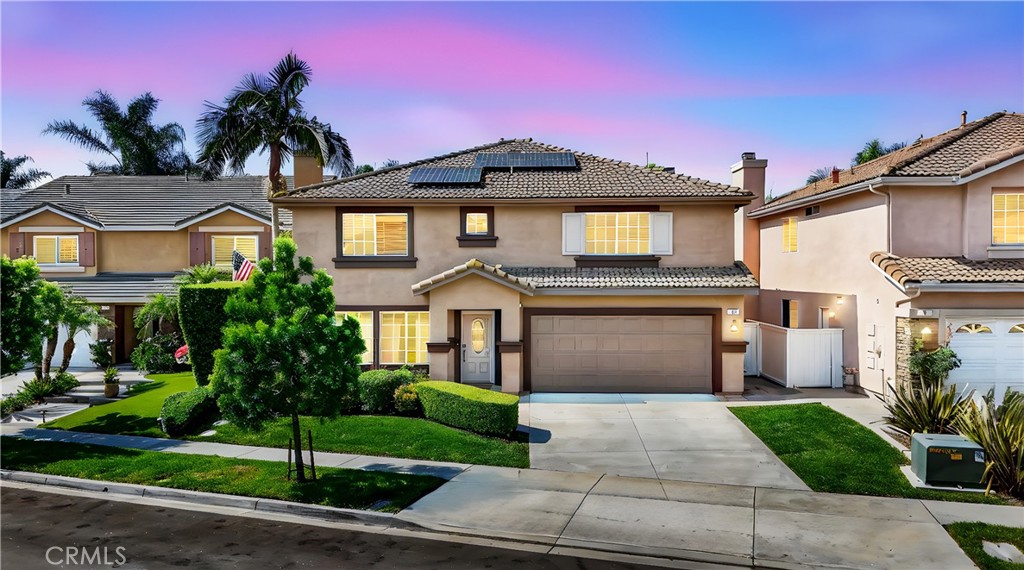 A RARE OPPORTUNITY in the highly sought-after Concord community of West Irvine! Welcome to a home where elegance meets comfort and every detail is designed for convenience and style. Perfectly positioned at the end of a private cul-de-sac, this luxury home sits on an expansive 5,745 sq ft lot and offers 5 bedrooms and 4 baths, including a MAIN FLOOR BEDROOM and bathroom ideal for guests, in-laws, multi-generational living, or a private home office. Step into a spacious and versatile layout, which includes a formal living and dining room that seamlessly blend to offer a refined space for hosting gatherings, along with a separate family room featuring a cozy fireplace with custom stone details for relaxed everyday living. At the heart of the home is the custom chef’s kitchen, showcasing a large center island, double ovens, oversized built-in refrigerator and freezer, large walk-in pantry, wine fridge, and a charming custom breakfast nook. Upstairs, enjoy DUAL PRIMARY SUITES, the main suite featuring a double door entry, luxurious bath with a soaking tub, separate glass-enclosed shower, and his and hers dream walk-in closets with abundant storage. Two additional generously sized bedrooms with walk-in closets and an upstairs laundry room complete the ideal second floor. Features and upgrades include travertine flooring, oversized crown molding, dual-pane windows, Nest thermostat, dual AC systems, newer 75-gallon water heater, ample storage cabinets in the garage, alarm and exterior camera system, and solar panels for energy efficiency. This OVERSIZED BACKYARD is truly an entertainer’s paradise, featuring lush landscaping, a generous patio area, 20’ BBQ island, and a large hot tub, perfect for gatherings or relaxing evenings. Enjoy LOW HOA dues and access to community amenities including a pool, spa, and tennis courts. Located just a short walk to award-winning Myford Elementary, and minutes from the Beckman Highschool, Marketplace, Tustin Sports Park, and Tustin Ranch Golf Course. For the added bonus, this home can be made available FULLY FURNISHED. A residence of this caliber is a rare find. Here’s your chance to own a truly distinguished home in one of Irvine’s most prestigious communities.