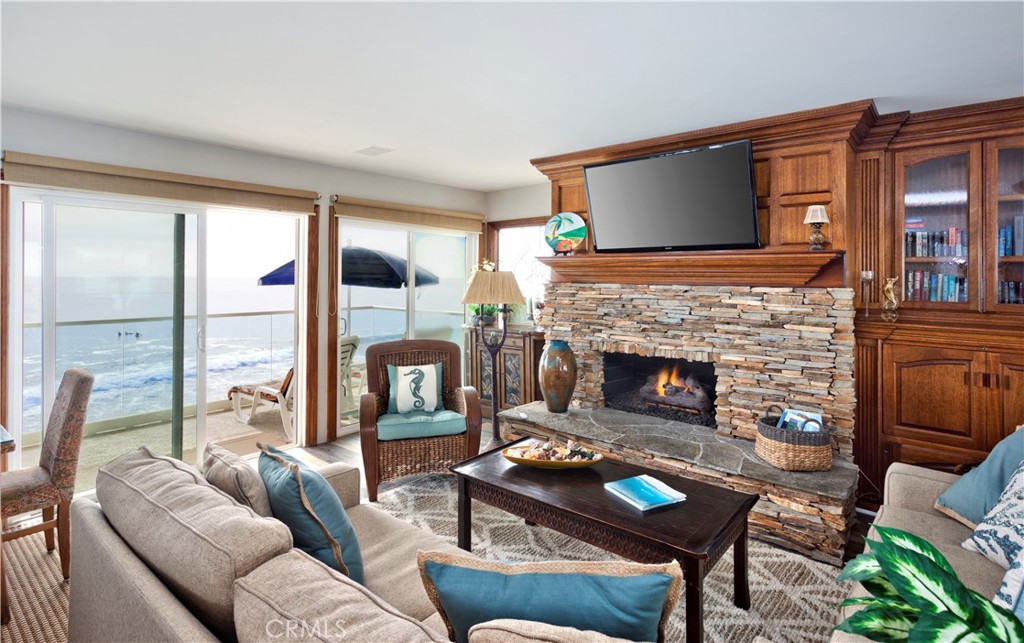 Enjoy a beautifully furnished oceanfront monthly rental available October, November and December, 2025, and again starting May 1, 2026.
This spacious three-bedroom, two-bath unit is located on Brooks Beach in Laguna.
Relax on the expansive balcony just steps from the beach, offering stunning 180-degree panoramic ocean views. Watch surfers at Brooks Street, spot dolphins, and take in breathtaking sunsets. The home is tastefully decorated with a calming, beach-inspired style. It features smart TVs in the living room and all bedrooms, along with high-speed wireless internet.
The prime location is within walking or trolley distance to numerous restaurants, art galleries, and Main Beach. We’re situated on Brooks Street Beach (a popular surfing spot), with Cress Beach (a great family beach) just to the left. The property boasts beautiful ocean views, sliding windows that lead to a large balcony over the ocean, and a cozy living room with a fireplace and large flat-screen TV. The master bedroom has a Cal King bed, a spacious lofted closet, and a large TV. The second bedroom also features a Cal King, while the third bedroom offers a Queen-sized bed. The space is bright and airy, with plenty of windows and mirrors to maximize the ocean views. Private stairs lead down to the beach.
Parking in the garage with charger is included, and utilities are covered. Available for monthly rentals.
Current availability begins October 1, 2025. Summer rates: June ($18,000), July/August ($24,000).