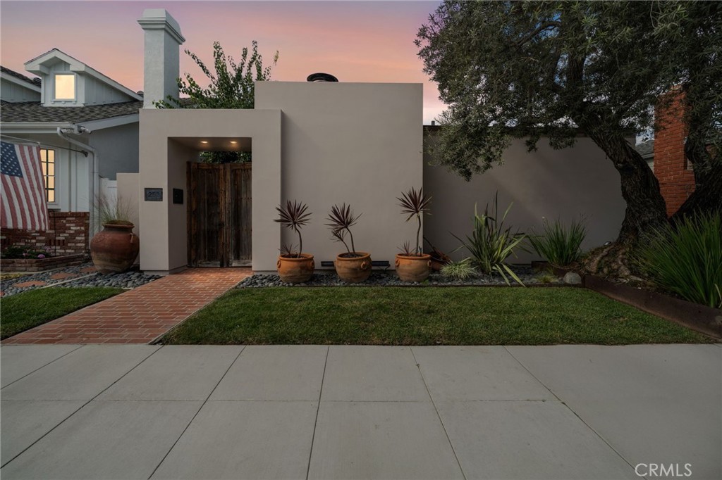 Experience modern coastal luxury on one of Naples Island’s most coveted streets Ancona Drive. This highly upgraded residence blends timeless architecture with seamless indoor–outdoor living, just steps from the scenic canals and a short stroll to 2nd Street’s premier restaurants, boutiques, and nightlife. The home is ideally positioned minutes from Belmont Shore beaches, Alamitos Bay Marina, Long Beach Yacht Club, and picturesque coastal bike paths, offering a walkable, exclusive lifestyle that few locations can match.
Inside, an airy, light-filled floor plan connects the living, dining, and kitchen areas to an inviting outdoor courtyard through brand-new sliding doors, creating a true indoor–outdoor living experience that’s perfect for entertaining. Upstairs, an expansive rooftop deck with a brand-new roof provides the ideal space to relax, dine, and enjoy coastal sunsets. The chef’s kitchen features a new dual-fuel Wolf range (gas cooktop + electric oven), Miele dishwasher, and reverse osmosis system. Both bedrooms now showcase new hardwood flooring, refinished throughout the home for a cohesive, elevated feel, complemented by new ceiling fans in the primary bedroom and living room.
Additional upgrades include a new downstairs A/C unit, freshly painted exterior, and a gas-starter exterior fireplace for effortless evening ambiance. A new roof and deck over the kitchen, living, and dining spaces complete the extensive list of enhancements. Every detail has been carefully considered to deliver the ultimate in comfort, functionality, and style.
This Ancona Drive home is more than a property it’s a modern coastal retreat offering luxury living in one of Southern California’s most desirable waterfront communities.