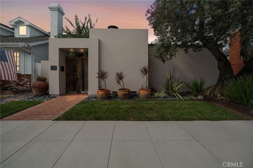Experience modern coastal luxury on one of Naples Island’s most coveted streets Ancona Drive. This highly upgraded residence blends timeless architecture with seamless indoor–outdoor living, just steps from the scenic canals and a short stroll to 2nd Street’s premier restaurants, boutiques, and nightlife. The home is ideally positioned minutes from Belmont Shore beaches, Alamitos Bay Marina, Long Beach Yacht Club, and picturesque coastal bike paths, offering a walkable, exclusive lifestyle that few locations can match.



Inside, an airy, light-filled floor plan connects the living, dining, and kitchen areas to an inviting outdoor courtyard through brand-new sliding doors, creating a true indoor–outdoor living experience that’s perfect for entertaining. Upstairs, an expansive rooftop deck with a brand-new roof provides the ideal space to relax, dine, and enjoy coastal sunsets. The chef’s kitchen features a new dual-fuel Wolf range (gas cooktop + electric oven), Miele dishwasher, and reverse osmosis system. Both bedrooms now showcase new hardwood flooring, refinished throughout the home for a cohesive, elevated feel, complemented by new ceiling fans in the primary bedroom and living room.



Additional upgrades include a new downstairs A/C unit, freshly painted exterior, and a gas-starter exterior fireplace for effortless evening ambiance. A new roof and deck over the kitchen, living, and dining spaces complete the extensive list of enhancements. Every detail has been carefully considered to deliver the ultimate in comfort, functionality, and style.



This Ancona Drive home is more than a property it’s a modern coastal retreat offering luxury living in one of Southern California’s most desirable waterfront communities.