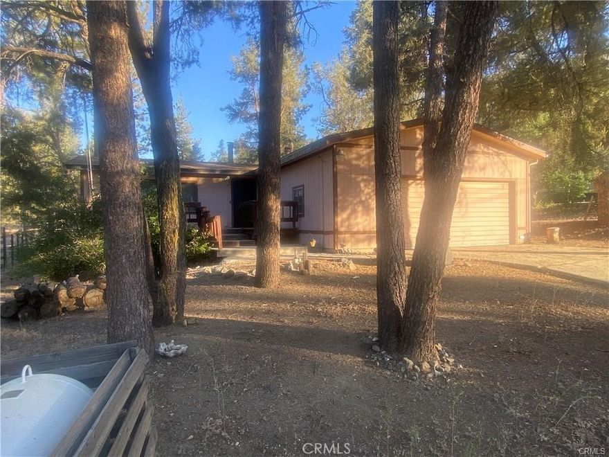 Affordable Mountain Retreat with Airbnb Potential!



This 2-bedroom, 2-bathroom 1983 manufactured home is set on a permanent foundation and situated on a 9,000+ sq. ft. privately owned lot with no monthly space rent. Located in Pine Mountain Club, the property backs directly to the Los Padres National Forest, offering direct access to hiking, wildlife, and outdoor recreation.



The single-level layout features a bright open floor plan, a spacious living area, a large garage, a dedicated laundry room, and ample parking. While the home is in need of updating, it presents an excellent opportunity for customization or investment. Short-term rentals are allowed in Pine Mountain Club, making this an ideal Airbnb or vacation rental prospect.



Enjoy all the amenities of this four-season resort community, including a newly renovated clubhouse with a pool, tennis courts, equestrian center, pickleball, golf course, restaurant, lounge, and year-round events. The charming village center offers shops, dining, and access to scenic trails and waterfalls.



Located less than an hour from Santa Clarita and Bakersfield, this property is perfect as a full-time residence, weekend getaway, or income property. Don’t miss this unique opportunity—schedule your showing today.