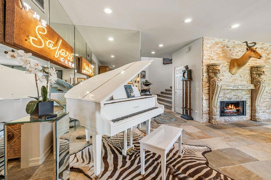 Immerse yourself in resort style living at Lake Mirage Racquet Club! Former Model home with sweeping corner lot, this 3 bed / 3 bath / 3,049 sq ft floor plan is one of the largest in the community. Showcasing high end finishes: custom cabinetry, granite countertops, new Milgard windows & sliders, a blend of plush carpeting and cool slate flooring, retextured & freshly painted walls, as well as designer details throughout. Entertain in style in the great room with a grand wet bar and floor to ceiling windows with remote controlled shades. Upstairs, the primary suite boasts dual bathrooms, massive walk in closets, and a private deck with breathtaking lake & mountain views. Outdoors the private PebbleTec pool & jacuzzi add luxury, while the shared electric boat dock and optional Yacht Club membership provide rare lake privileges. With full resort style amenities (tennis, pickleball, fitness center, club house, multiple pools etc.), this is polished perfection for discerning buyers.