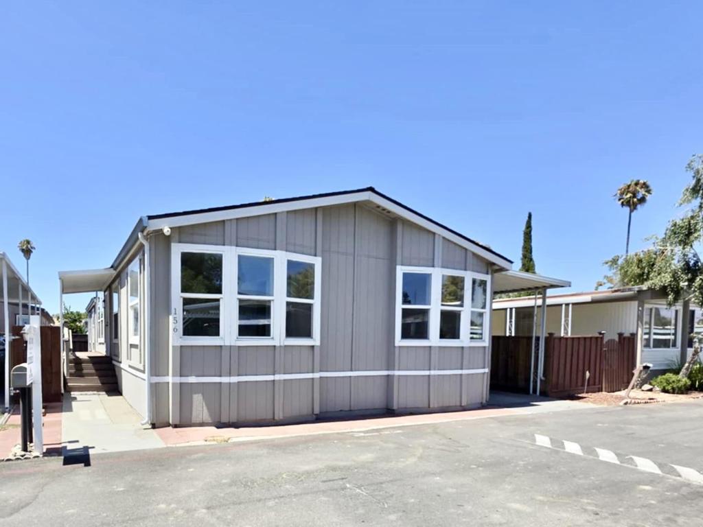 Welcome to 3637 Snell Avenue, a charming mobile home with modern design and large living space for extended family. Nestled in the peaceful gated Cal Haiwaiian community of San Jose, this home boasts 1,672 square feet, featuring four bedrooms and two bathrooms plus bonus room. Step inside and be greeted by open floorplan, vaulted ceilings, and abundant natural light streaming through lots of dual-pane windows. The open-concept kitchen features quartz countertop, modern tile backsplash and complete set of stainless-steel appliances, perfect for whipping up your favorite meals. The primary bedroom comes with a spacious bathroom, providing a serene retreat. The exterior offers a covered carport that fits up to three cars, and a good-sized yard for gardening. This home is conveniently located near a variety of shopping centers, dining options, and recreational parks. Whether you're a first-time buyer or looking to downsize, this home is a fantastic find. Don't miss your chance to make this place your home sweet home!