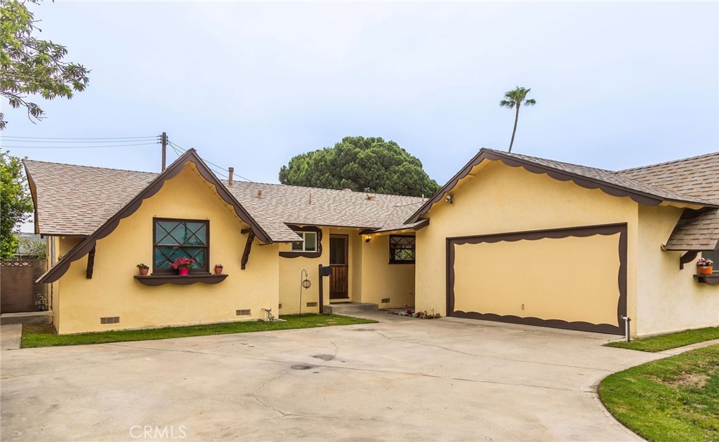 Single family residence of approximately 1104 sq ft, ranch-style home with three spacious bedrooms & two full bathrooms situated on a large (approx. 7,200 sq ft) flat lot in the heart of Garden Grove. The backyard features a large, functional shed, two lemon trees, sprinklers and a very roomy (approx. 11’ x 22’) covered patio. Comp shingle roof on house and patio were updated 10/2020. Front yard has a curved driveway large enough for about 4 cars; flat lawn area serviced by automated sprinklers; and a breezeway that connects the two-car garage to the house. Several updates to this home include: Central air ductwork & coil (2016), condenser unit (2021); hot water heater (2024); vinyl sliding glass doors & window (2023); bathroom windows (2021); lighted & vented range hood over GE stove/oven (2020); & kitchen flooring (2021). Generously sized living room with oak flooring has a wood burning fireplace & direct access to the patio/backyard. Primary bedroom features a private outside entrance plus an en suite bathroom with tiled shower. Second bedroom is light & bright with windows facing north & east. Third bedroom has built-in shelving and a view of backyard. This house is conveniently located near shopping, freeway access and is about 3 miles south of Disneyland! Contact agent (Jim Hall Lic. #02138657) to view property. Time to make this house your home!