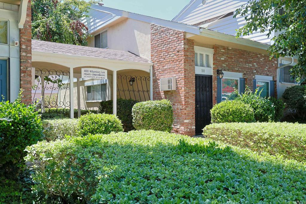Welcome to this beautifully updated 2-bedroom, 2-bathroom ground-level condo in the charming Williamsburg Ln community. Featuring remodeled bathrooms, fresh paint, and laminate flooring. The bright kitchen boasts white cabinets, quartz countertops, and stainless steel appliances, while the dining area opens to a private balcony perfect for morning coffee or evening relaxation. Enjoy the peaceful ambiance of the French-inspired architecture, complemented by community amenities such as a pool and convenient laundry rooms. This unit includes a 1-car garage plus an additional open parking space. Ideally located near freeway access, shopping, dining, and just a short drive to downtown San Diego, naval bases, and local attractions.