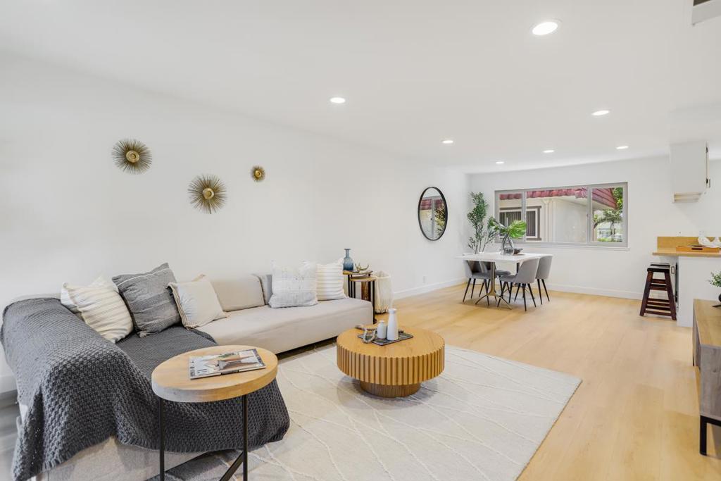 Welcome to this beautifully updated and spacious two-bedroom, two-and-half-bath townhome with PUD ownership in a prime Santa Clara location! Enjoy privacy with no neighbors right in front or behind, plus modern upgrades throughout. Step inside to fresh interior paint, new luxury vinyl plank flooring, and abundant natural light. The open-concept kitchen overlooks the community greenbelt and features a delightful breakfast bar, granite countertops, double sinks, SS appliances, and newly refinished cabinets. New light fixtures and hardware add a modern touch. The thoughtful floor plan includes a convenient half bath on the main level and laundry on the bedrooms floor. Relax by cozy fireplaces in both the living room and primary suite. Two generous sized bedrooms. Large his-and-hers closets in primary. Central heating and AC. The attached side-by-side 2-car garage provides ample storage you've been looking for. Community amenities include a pool and green space for outdoor enjoyment. Perfectly located in the heart of Silicon Valley, with major employers like NVIDIA and Apple just a few miles away. Proximity to parks, schools, shops (Target, Sprouts, etc.), food places, library, Santa Clara downtown, Santa Clara University, Caltrain and more. Easy commute to high-techs and freeways.