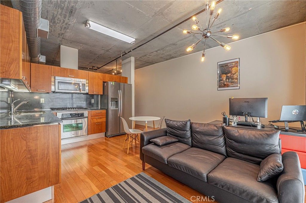 Photo of 645 W 9th St #301, Los Angeles, CA 90015 (MLS # IV25259809)