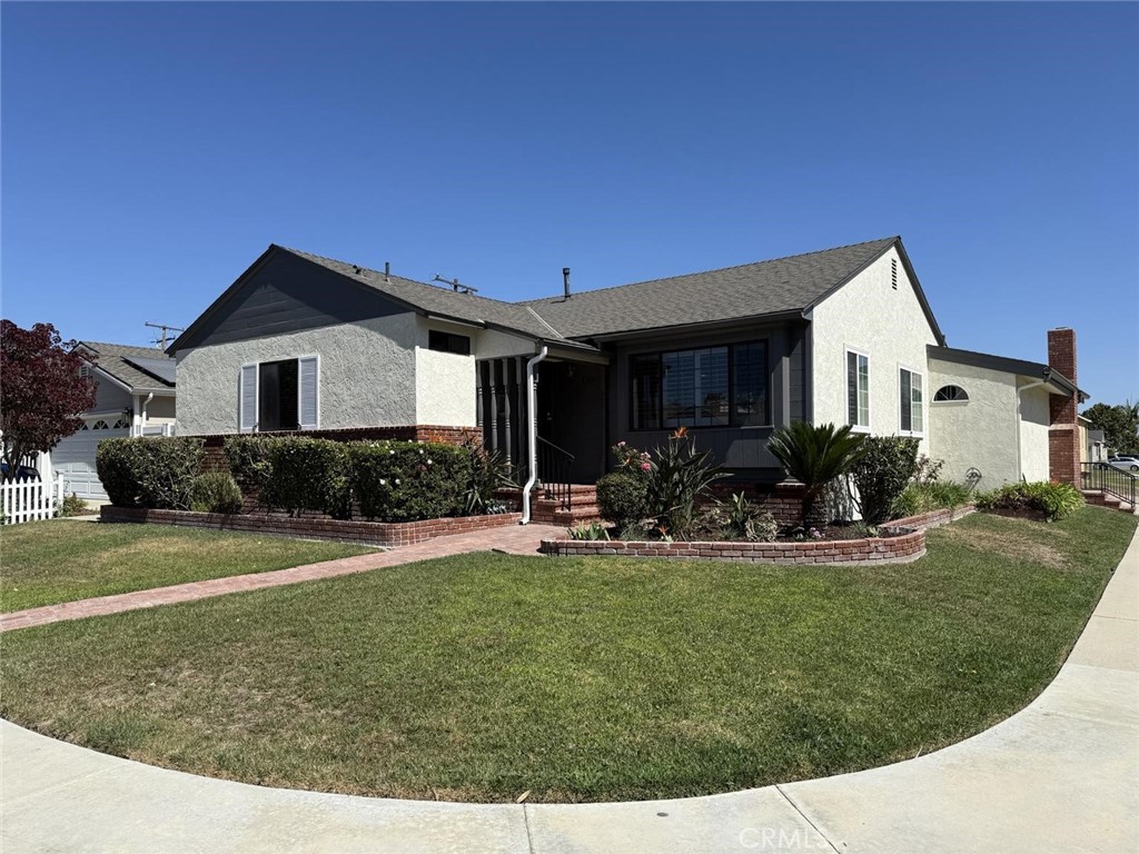 Welcome to this updated 3-bedroom, 3-bathroom single-family home offering 1,753 sq. ft. of comfortable living space in the highly desirable Carson Park neighborhood of Long Beach. One of the bedrooms is a private ensuite with a spacious closet, while the large family room with a cozy fireplace is perfect for relaxing or entertaining. The garage has been converted into a versatile bonus room, adding even more usable space. Recent upgrades include an updated kitchen, refreshed bathrooms, new flooring, baseboards, and fresh paint inside and out, giving the home a modern and move-in-ready feel.
Set on a corner lot with charming curb appeal, this home also offers a generous backyard complete with mature fruit and avocado trees, creating a private retreat for outdoor gatherings or quiet evenings at home. A separate laundry room adds everyday convenience, rounding out the thoughtful floor plan. Located near top-rated schools, great parks, and convenient shopping, this home combines updates, functionality, and a prime location in one of Long Beach’s most desirable neighborhoods.