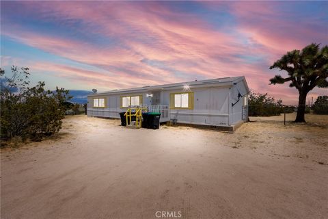 Photo of 12837 Hacienda Rd, Phelan, CA 92371 (MLS # TR26082396)