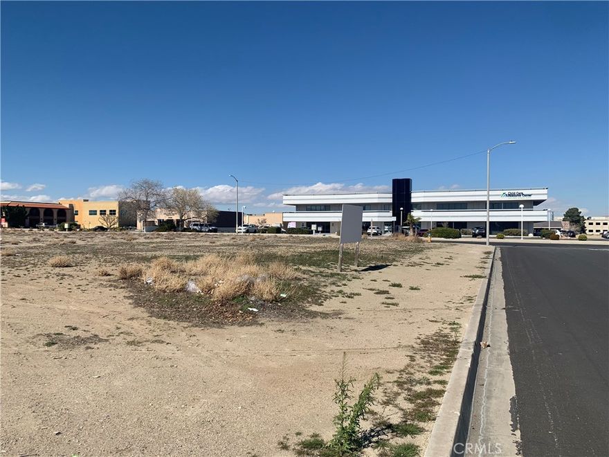 ±0.56 acres of unimproved commercial land for sale on the corner of Sage St & Cajon Ave in Victorville; APN: 0396-154-06. Zoned Civic Business Center under the Civic Center Specific Plan, this lot will permit for the development of professional office and associated retail/service uses serving the neighboring government/service districts. Water, sewer, and power are all at site. This property is located in a Qualified Economic Opportunity Zone and may be eligible for preferential tax treatment. Neighboring businesses include Victorville City Hall, Victorville Superior Court, InterCon Security, Mojave Desert Air Quality Management District, The Woodall Group, and more. Buyer to verify all information contained herein. Agent and their representatives are not responsible for the accuracy of these claims.