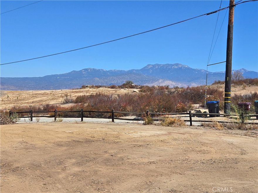 1.55 Acres with pad area in the Hills just above East Hemet. King of this hill view on these parcels. Three APN#s with this sale: Parcels 555-350-029 and 555-350-030 and 555-350-027 included in this listing.  Desirable neighborhood of estate homes with great views of the Valley and Mountains. Great location with a rural feel yet just minutes outside the city. Zoning is R-1-1 and elevation is 2166 Feet. No HOA. Adjacent lots available for sale from same owner for anyone wanting a larger parcel in this area.