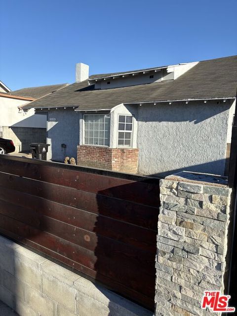 Photo of 1110 W Vernon Avenue, Los Angeles, CA 90037 (MLS # 25564743)