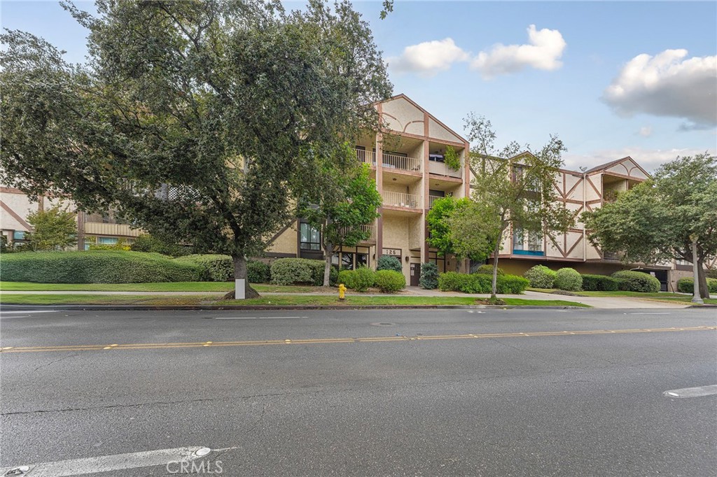 Nestled in one of Pasadena’s most sought-after neighborhoods, this immaculate 2-bedroom, 2-bath condo offers a perfect blend of peace and modern convenience. Whether you're looking to unwind or entertain, this thoughtfully designed home provides a serene escape while staying close to the vibrant city life. Unit 312 welcomes you with a spacious living room featuring a cozy decorative fireplace, and large sliding glass doors that lead to a private rear patio overlooking the pool and lush landscaped grounds. The open-concept layout connects a dedicated dining area to a well-equipped kitchen with ample counter space and storage. A stylish bathroom adds extra convenience for guests. The living area also opens to a private balcony—ideal for morning coffee or unwinding in the evening. Both bedrooms are generously sized, perfect for hosting guests or setting up a home office. The primary suite serves as a true sanctuary with a sun-filled bedroom and en-suite bathroom. Enjoy resort-style amenities including a sparkling community pool, fitness center, saunas, onsite laundry, and two tandem parking spaces. The beautifully maintained complex also features an inviting lobby and serene green spaces. Just minutes from Colorado Boulevard, this prime location puts you close to Pasadena’s best shopping, dining, and entertainment. Don’t miss your chance to own this rare combination of comfort, style, and convenience.
