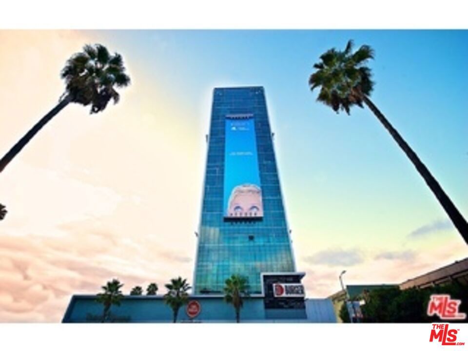Available immediately. 6th floor 1BD/2BA open loft style apartment. This gorgeous unit includes floor to ceiling windows, stainless steel kitchen appliances, in-unit washer/dryer,hardwood flooring throughout,tons of natural sunlight and much more. Community amenities include sparklingly pool, fitness center and 24 hour front desk service. Neighbor to the Hollywood landmark Cinerama Dome this community is a conversion of a 22-story office building into a 63-unit apartment building. The retail shops on ground level include Starbucks, Chipotle, Tender Greens &Star Bucks. Photos may consist of similar model units and virtually staged renderings.