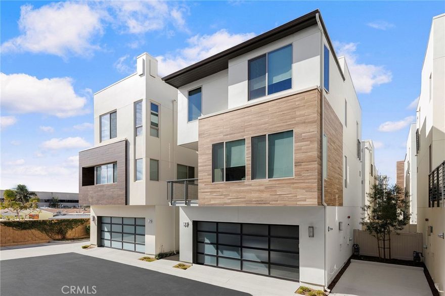 This newer constructed tri-level residence, nestled within Newport Beach's vibrant Ebb Tide community, exudes elegance and style. It is destined to become a cherished hub for gatherings with loved ones. The home offers stunning vistas , captivating sunsets, twinkling city lights, and the grandeur of Saddleback Mountain from its rooftop perch.



Meticulously designed with contemporary touches, this immaculate abode boasts a rooftop terrace oriented towards the panoramic views. The terrace includes an alfresco kitchen featuring a grill and granite countertops. The residence comprises 3 bedrooms, 3.5 baths, and a main-level office with a full bath that easily transitions into a fourth bedroom to accommodate lifestyle needs. Spanning approximately 1,843 square feet, the sought-after open layout seamlessly connects expansive living spaces to a kitchen adorned with a generous waterfall island, premium Bertazzoni appliances, powerful range hood, and a welcoming balcony.



The interiors are adorned with paneled interior doors, pristine white cabinetry, modern lighting fixtures, and bespoke tile work, exuding sophistication. Additionally, a two-car garage with a frosted-glass roll-up door offers added convenience. The opulent master suite boasts lofty ceilings, abundant windows, and a lavish bath, epitomizing contemporary luxury.



Residents of Ebb Tide enjoy resort-style amenities, including a pool, spa, and refined communal areas for socializing. World-famous beaches are just moments away, while upscale boutiques, dining venues, and cultural attractions are mere minutes from the doorstep. This residence offers an unparalleled coastal lifestyle.