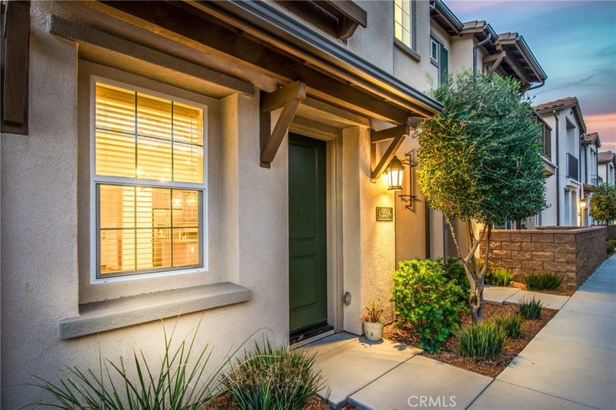 This gorgeous condo is in the exclusive Rancho Soleo Community in Temecula This beautiful community is located close to award winning schools, plenty of shopping and endless entertainment Built in 2021, this elegant townhome is packed with upgrades from fully paid-off solar panels which mean huge savings on your electric to gorgeous designer flooring that flow throughout there is also designer lighting that is stunning and elegant throughout This town home is a 3 bedroom 2 and a half bath with all bedrooms upstairs for ultimate privacy Upstairs is where you will find your laundry with a brand new washer and dryer. You will also enjoy a beautiful walk out balcony off the guest bedroom. The master features a large walk in closet and a full bathroom with upgraded counter tops and cabinets not to mention double sinks. The kitchen is upgraded with quartz countertops, custom cabinets, stainless steel appliances, designer drop lighting and a large walk in pantry With easy entry through garage door and half a bath for convenience There is plenty of room for a full size dining table and additional seating is available at the kitchen island The open concept lay out gives you plenty of option for a relaxing and roomy living area. Take in some sun and walk out into your patio for a cup of coffee or BBQ with friends This gated, Spanish style community is loaded with resort-style amenities You will have access to the HOAs sparkling pool & jacuzzi, a chic clubhouse, dog park, BBQ areas, and plenty of playgrounds all within your community This home also offers reverse osmosis water filter throughout the home and it is a gated private community for your security