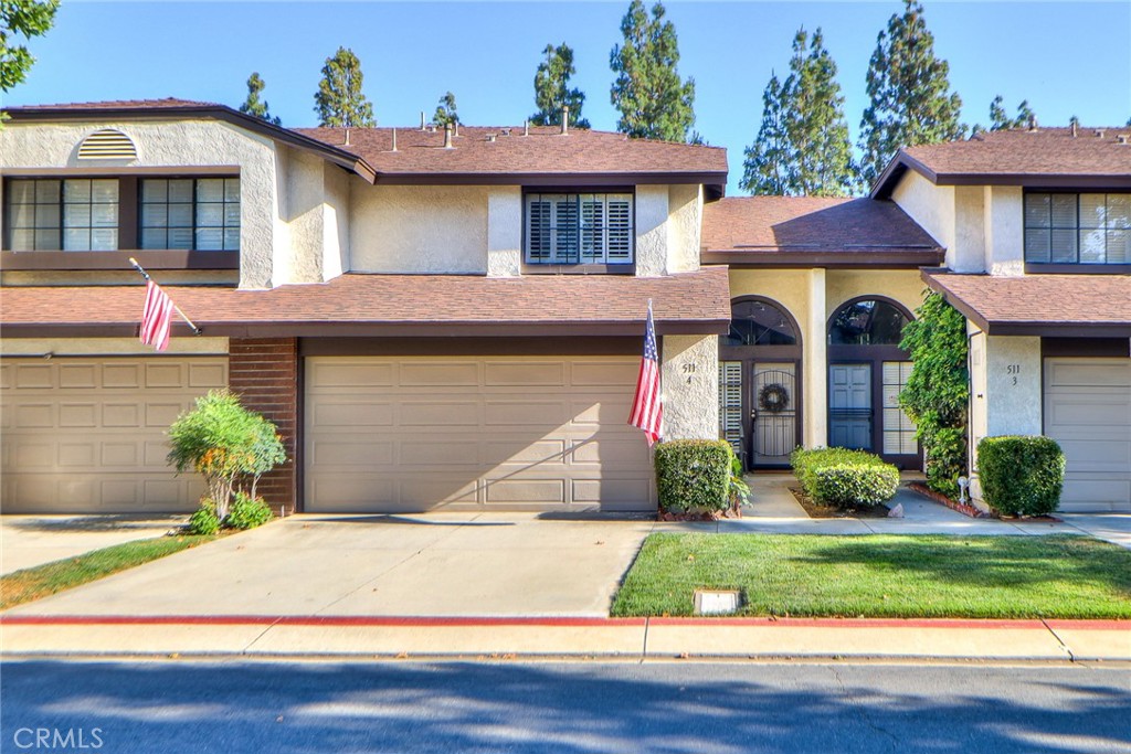 Centrally located condo in the popular Heathdale Community complex. The home has many attractive features including an open floor plan with fireplace in the living room, two large main bedroom suites each with separate bathrooms and dual mirrored closets, and a finished attached garage PLUS a two-car driveway for plenty of off-street parking! Open kitchen and vaulted ceilings. Great location close with schools and parks, great restaurants and shopping all nearby. Very nice community with Association Pool and Spa, this vibrant neighborhood in Covina is a great place to call home! As you enter this serene complex, you'll be greeted by well-kept streets that promise a tranquil lifestyle. Step inside to discover a grand living room that's a breath of fresh air, featuring high ceilings, a cozy fireplace, and an abundance of windows that flood the space with natural light, and the downstairs powder room is near the entry for easy guest and family access. Quality window shutters throughout! Next to the living area, the generous dining space provides a seamless flow into the kitchen. Sliding doors from the dining area open to a patio, with gas line stub, electrical outlet and hosebib, making it an ideal spot for BBQ or enjoyng your outdoor space and plants. The patio also offers a convenient additional gate entrance. The property also includes a large 2-car finished garage with washer and dryer hook-ups. Don't miss your opportunity to make this inviting Covina property your place to call home.