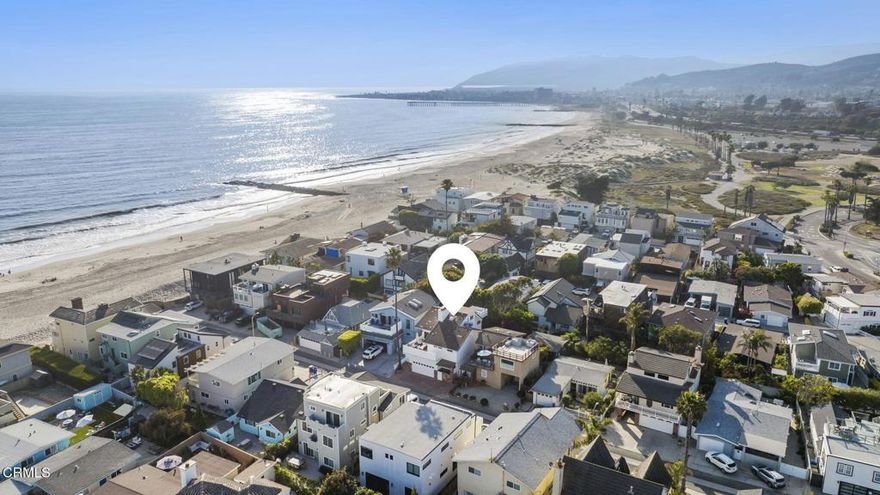 Permanent Ocean Views & Steps to the Sand - Your Pierpont Beach Dream Home Awaits!Welcome to true beachside living in this beautifully appointed Pierpont retreat, just six lots from the sand and only two lanes from the scenic boardwalk--perfect for bike rides or sunset strolls to the Ventura Pier and Downtown.Enjoy stunning, permanent ocean and island views from your own living room, while cool breezes and the sound of crashing waves complete the ultimate coastal experience. With over 2,500 square feet of living space, this versatile home offers 4 bedrooms, 3 full bathrooms, two expansive viewing decks, and a large backyard--perfect for entertaining or relaxing after a day at the beach.The main level welcomes you with a cozy living area featuring a fireplace, two bedrooms including a spacious primary suite with full bath, and access to a private backyard with charming brick patio--ideal for BBQs, gardening, or outdoor gatherings.Upstairs, original hardwood floors and vaulted exposed ceilings are filled with natural light. The open-concept living and dining areas are designed to take full advantage of the sweeping ocean views and open onto a generous viewing deck. The updated kitchen features granite countertops, a large center island, stainless steel appliances, and a walk-in pantry. A third bedroom with ensuite bath and an additional full guest bathroom complete the second floor.On the third level, you'll find a flexible fourth bedroom or perfect work-from-home office, featuring a large walk-in closet and a private balcony with views of the Ventura hills.Situated near local favorites including restaurants, coffee shops, shopping, and convenient freeway access, this home is ideal as a full-time residence, weekend getaway, or high-demand investment opportunity.Don't miss your chance to live the Pierpont lifestyle!