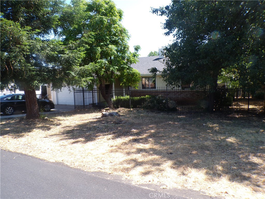 Conveniently located in the beautiful Hidden Valley Lake community this 3 bedroom 2 bathroom home is spacious with a wonderful floor plan. The yard is well maintained with a solid iron gate around it. There is a large driveway for ample parking. A large 2 car garage with plenty of room for a workshop. Inside the home you have a large open concept living and dining room, nice kitchen, a fireplace and a bonus sunroom that adds over 500 square feet of additional living space! The area itself is amazing as well. It's a gated community with swimming pool, private lake, hiking trails, biking and far more!