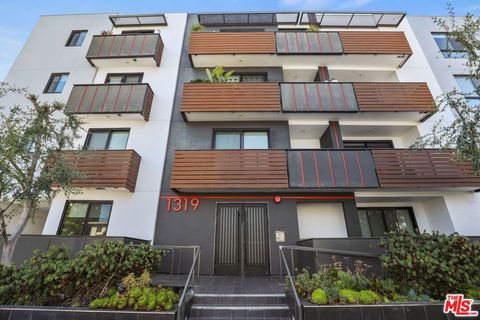 Photo of 1319 Martel Ave #103, Los Angeles, CA 90046 (MLS # 25491113)