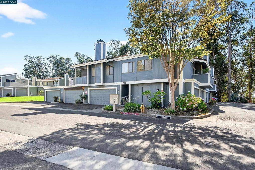 Welcome to 218-4 Apollo, where bayside living blends seamlessly with comfort and convenience. This spacious 2-bedroom, 1.5-bathroom corner condo is tucked inside the highly sought-after Olympian Hills community. Step inside and you’ll be greeted by an abundance of natural light, framed by serene views of eucalyptus trees from the open family and dining area. The kitchen offers ample cabinet storage and connects effortlessly to the living space, while the private patio extends your home outdoors—perfect for morning coffee or tending a patio garden. Upstairs, the primary suite impresses with an oversized closet and en-suite bath, and amazing views, creating a true retreat. With no neighbors above or below, peace and privacy come standard. Everyday convenience is elevated by an in-unit washer and dryer plus a two car garage. Olympian Hills residents enjoy resort-style amenities including swimming pools and tennis courts. Commuting is a breeze with easy access to HWY 80 and HWY 4, along with the Hercules Transit Center offering BART and downtown San Francisco connections. Discover a life of ease, privacy, and convenience at 218-4 Apollo—your perfect bayside retreat.