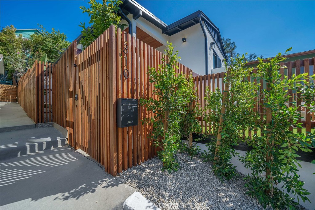 Welcome to 1310 N. Occidental Blvd., a Beautifully Remodeled Silver Lake retreat in the heart of the city. This stylish home features an open-concept floor plan filled with natural light, gorgeous new flooring, and a thoughtfully designed flow perfect for both entertaining and everyday living. The chef’s kitchen shines with custom cabinetry, quartz countertops, and high-end appliances, opening to inviting living and dining spaces. The primary suite offers a serene escape with direct access to a private patio, creating an intimate outdoor retreat. Additional bedroom is spacious and versatile, complemented by the spa-like bathroom with stylish finishes. Step outside to a terraced backyard designed for California living, complete with a fire pit, sitting area, and a separate deck showcasing panoramic hillside views — the perfect backdrop for dining al fresco or hosting friends. Plus Cherimoya and Guava Trees !! Separate spacious laundry room off of the kitchen and a finished two-car garage offers flexibility as a studio, gym, or creative workspace. With its blend of indoor-outdoor living, proximity to Silver Lake’s trendy dining, shopping, dog park and the reservoir, this home is an exceptional opportunity in one of L.A.’s most sought-after neighborhoods. Schedule your tour today!