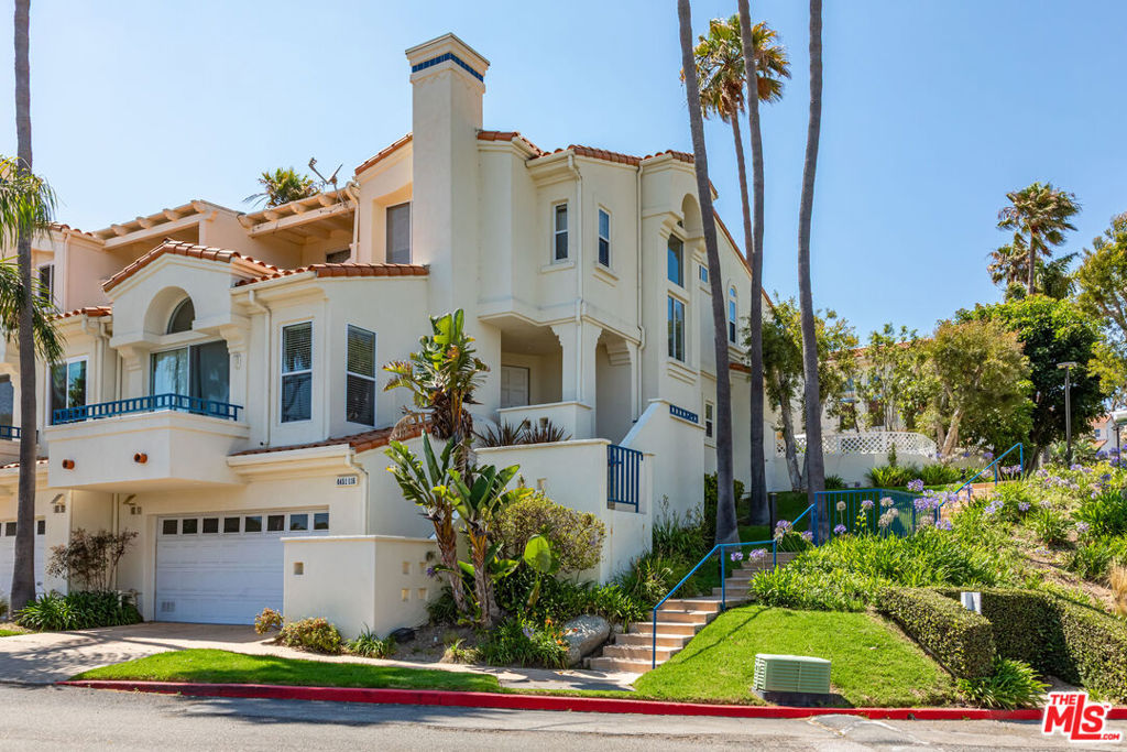 Located in the exclusive and gated community of The Pointe, this sun-filled end-unit offers ocean views and resort-style amenities just moments from Zuma Beach. The open floor plan features a high-ceiling living room with fireplace, an expansive dinning room, granite kitchen with stainless steel appliances, and multiple balconies for indoor-outdoor living. The ocean-view primary suite boasts a private balcony and spa-like bath. Enjoy your oasis just moments from Paradise Cove & Zuma Beach, a two-car garage with storage, access to a pool, spa, gym, and tennis courts all close to Malibu's shops, dining, and trails.