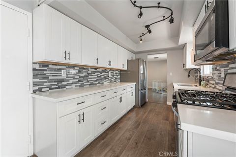 Photo of 9946 Owensmouth Ave #9, Chatsworth, CA 91311 (MLS # SR26075660)