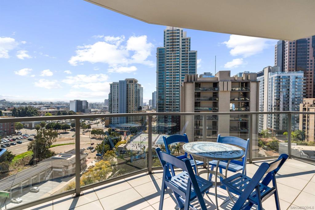 Experience elevated city living in this sleek and stylish condo perched in the heart of Cortez Hill, where sweeping southern and westerly views stretch endlessly before you. From your oversized private balcony, enjoy dazzling sunsets and even a peek-a-boo glimpse of the Coronado Bridge—an inspiring backdrop whether you’re relaxing or entertaining. Perfect for the minimalist homeowner or as a lock-and-leave second home, this rare find also allows 30-day minimum rentals through Airbnb and VRBO, making it an outstanding investment with flexible living options. Inside, floor-to-ceiling windows bathe the home in natural light, highlighting chic vinyl plank flooring and a chef’s kitchen with stainless steel appliances. Smart Nest thermostats ensure comfort year-round.The Aria building offers an impressive collection of amenities: unwind by the heated pool, soak in the jacuzzi, stay fit in the gym, or gather with friends in the stylish lounge. Two-car tandem secured underground parking adds everyday convenience. All of San Diego’s best is right at your doorstep—Hillcrest, Bankers Hill, Little Italy, Balboa Park, Petco Park, and the harbor are just a short stroll away. Don’t miss the chance to own this modern, flexible retreat in one of downtown San Diego’s most sought-after communities. Welcome to Aria at Cortez Hill.
