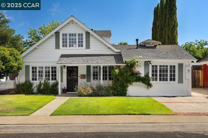 OPEN 10/19, 1PM-4PM! Located in the Canterbury Village community in Concord, this lovely home offers modern comfort and timeless charm! Step inside to a freshly painted interior and exterior, a warm and welcoming floor plan, engineered hardwood flooring, and an abundance of natural light throughout. At the heart of the home is the thoughtfully designed kitchen, featuring a center island, contemporary fixtures, and generous storage. The spacious laundry room adds extra flexibility, offering plenty of space to double as a home office or additional storage. With two bedrooms and one full bath on each level, the versatile four-bedroom layout easily accommodates a variety of living arrangements, whether you need room for guests, multigenerational living, or a private office. Outside, the flat lot and expansive backyard offers a serene retreat—ideal for entertaining friends and family or quiet evenings at home. The detached garage has been nicely finished, offering endless possibilities—perfect for a home gym or relaxed hangout space. This is your chance to enjoy comfort and a welcoming neighborhood all in one special home!