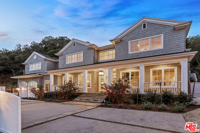 Magnificent brand new Ken Ungar designed traditional in coveted lower Mandeville Canyon. 5 Bedrooms, 7 bathrooms. Grand entry with high ceilings. Formal living and dining rooms with coffered ceilings. Huge family room/kitchen combo with great flow to the outdoor areas. Gourmet kitchen with Calcutta marble counters, large center island, top of the line appliances, walk-in pantry and eat-in area. Expansive master bedroom suite with fireplace, separate sitting room, balcony overlooking the back yard and oversized walk-in closet. Master bathroom features dual vanities, huge walk-in shower and free-standing tub. 3 Additional bedrooms suites, a gym/yoga room and second family room complete the upstairs. 1 Additional bedroom suite, spacious office, den or playroom, walk-in wine cellar and bar complete the downstairs. Fully integrated smart house and professionally equipped home theater. Extra-large lot with outdoor living room, built in BBQ area, large grassy yard with pool and spa.