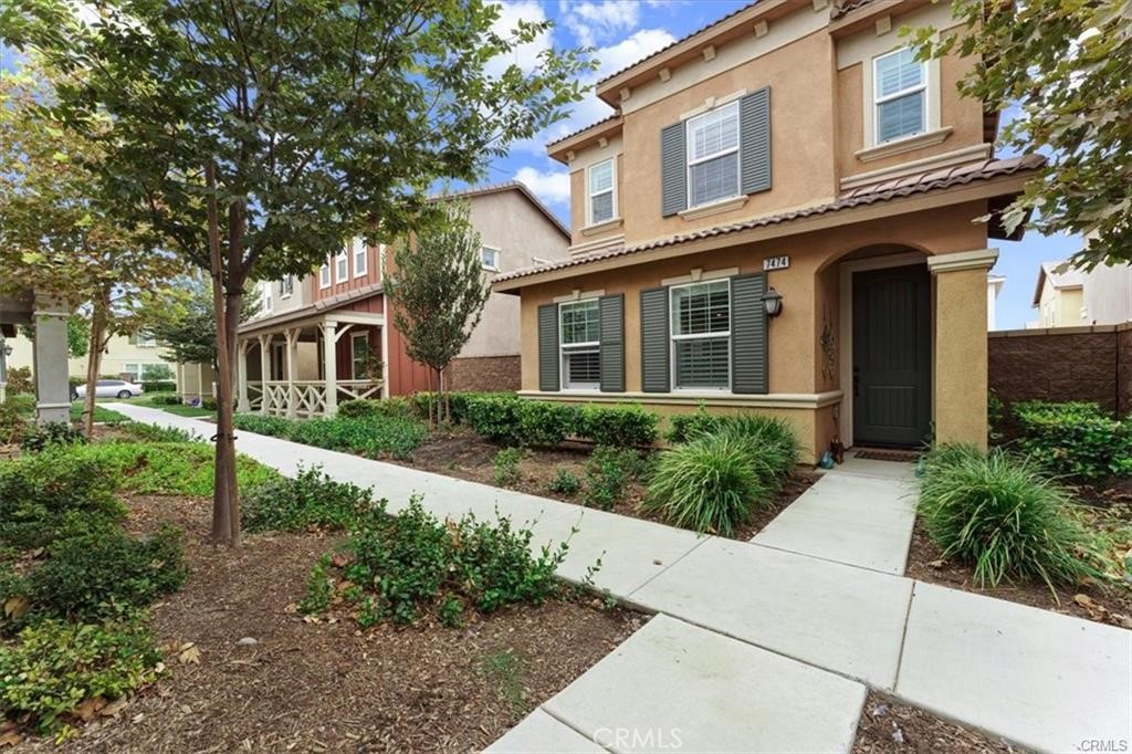Welcome to this stunning move-in ready home built in 2018 in The Preserve at Chino. This two-story residence offers 2,098 sq. ft. with 4 bedrooms, 3 bathrooms, and a versatile loft. The main level features an open-concept great room, a chef’s kitchen with large island and ample cabinetry, plus a full bedroom and bath ideal for guests or multi-gen living. Upstairs, the primary suite boasts a walk-in closet, dual sinks, soaking tub, and separate shower, with two additional bedrooms and a loft. The larger backyard has stamped concrete and a BBQ gas hookup. Additional highlights are a tankless water heater, leased solar system, and EV-ready garage. Community amenities include pools, parks, clubhouses, fitness centers, playgrounds, and basketball. Close to Hwy. 71, Chino Hills State Park, top shopping and dining, and within top-ranked schools. A new town center nearby adds to this prime location.