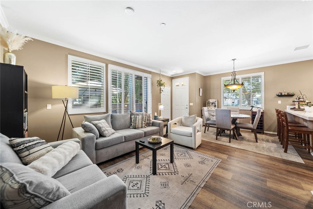 Welcome to this spacious 2-bedroom, 2.5-bathroom townhome located in the desirable Main Street at Route 66 gated community in Rancho Cucamonga. Offering 1,381 sq. ft. of comfortable living space, this end-unit home features a bright and open floor plan designed for both relaxation and entertaining.
Highlights include:
Inviting living room with cozy fireplace and direct access to the dining area
Functional kitchen with plenty of storage and convenient entry from the attached 2-car garage
Indoor laundry area and downstairs powder room
Upstairs you’ll find two generous bedrooms, each with its own full bathroom, plus a versatile loft ideal for an office, gym, or additional living space
Private side yard, perfect for outdoor dining or quiet enjoyment
Community Amenities:
Gated entry for added security
Resort-style pool, spa, clubhouse, BBQ area, and playground
Beautifully landscaped grounds with plenty of guest parking nearby
Additional Details:
HOA dues: $370/month
Located within the highly acclaimed, award-winning Etiwanda School District
Conveniently close to major freeways, Ontario International Airport, shopping, dining, and entertainment
Just minutes from Victoria Gardens and Ontario Mills Mall
This charming condo combines comfort, convenience, and top-rated schools within a sought-after community lifestyle—don’t miss your chance to call it home!