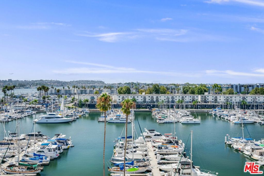Unobstructed Ocean & Marina Views to Catalina Island. two-bedroom two bath condo has an open floorplan. Spacious living room that leads to a large balcony perfect for entertaining. Serene & Peaceful. Located in the iconic Marina City Club. Hardwood flooring throughout, ample storage, breakfast bar, Primary bedroom & Living room have Marina & Ocean views. Marina City Club amenities include: 6 tennis courts, 3 swimming pools, pickle ball, racquet ball, 16,000sq ft gym with state-of-the-art equipment. Free classes (yoga, Pilates, stretch, cardio & more). Full bar & restaurant with room service, Cafe, beauty studio, maid service, dry cleaning service, car wash & 24-hour security. Great location close to Abbot Kinney, Shopping centers, restaurants, the beach & so much more. This is a great opportunity to enjoy all Marina del Rey offers and make this coastal dream your own.