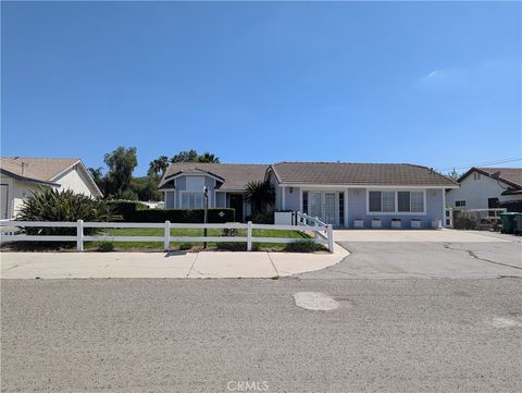 Photo of 31273 Montgomery Avenue, Nuevo, CA 92567 (MLS # SW26106488)