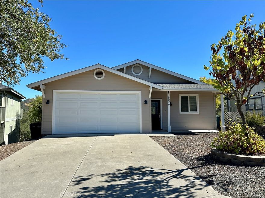 This like-new single-family home is a must-see, ideally situated on a peaceful cul-de-sac within the highly sought-after Heritage Ranch premier lake community.
This impressive residence features an open floor plan with expansive windows and glass doors that lead to a large open deck, offering beautiful views of the surrounding hills and green belt. The spacious dining area complements a well-appointed kitchen, complete with a 36" gas range with four burners and infrared griddle, granite countertops, a built-in refrigerator, a wine fridge, and convenient breakfast bar seating. Comfort is ensured with central air and heating, ceiling fans, and elegantly tiled counters and showers throughout.
The main living level includes the primary bedroom, which boasts a large walk-in closet and an updated bathroom featuring a luxurious soaking tub, as well as a guest bathroom. On the lower floor, you will find two additional large bedrooms and a full bathroom. The laundry facilities are conveniently located within the spacious two-car garage.
Residents of this home will enjoy full access to all the exceptional amenities offered by the Heritage Ranch community, including a grocery store, gas station, restaurants, veterinarian services, a dog park, swimming pools, tennis courts, a playground, an equestrian center, RV parking, and a private boat launch ramp.