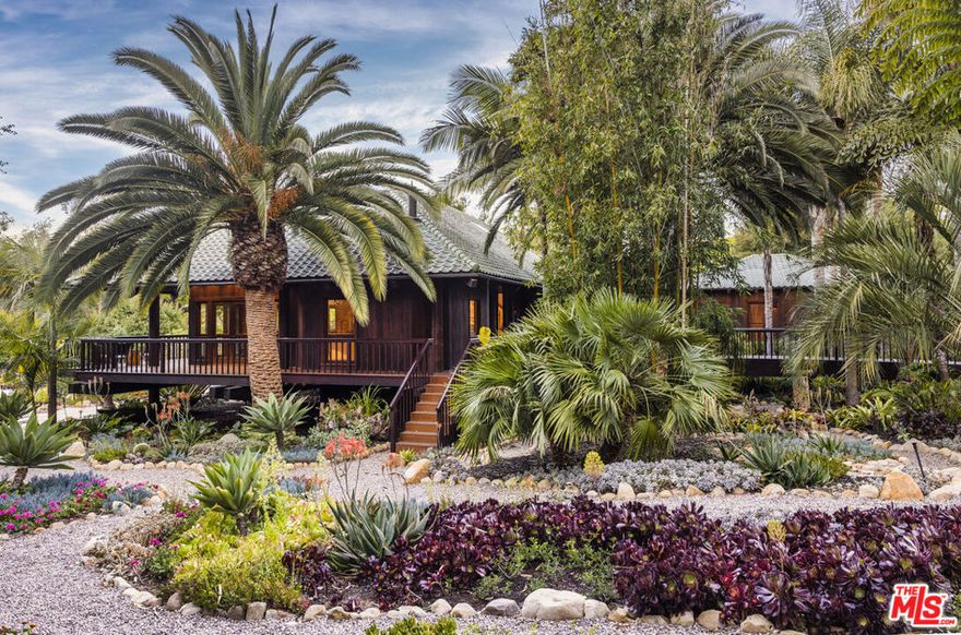 A tropical JAPANESE FARMHOUSE in the heart of Montecito, this 4BD/3.5BA residence features minimalistic design & is characterized by simplicity & a connection to nature. Framed by palms & coastal light, rich w organic textures & clean architectural lines, the home features polished concrete floors, expansive windows, & an open layout. The tranquil primary suite offers a spa-like retreat, & 3 additional bedrooms plus a detached studio & bath provide versatile space for guests, work & wellness. Meandering paths, vibrant landscaping, & a sun-drenched pool/spa set the tone for relaxed luxury just moments from Montecito Union School, the Upper Village & Hammond's Beach. Simplicity, purity, open spaces & function are the hallmarks of this one of a kind property.