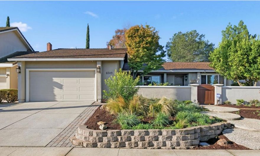 Beautiful upgraded home on a large 8140+/- SF lot, nestled in the Pierce Ranch neighborhood, across from the serene Almaden Meadow Park.  Step through a paver landscaped courtyard into a welcoming entry w/tile flooring, skylight & decorator mirrors. The living room boasts a cathedral ceiling, a large window looking out to front courtyard, and seamlessly blends into a dining room combo ideal for entertaining. Gourmet kitchen is a cook's dream, featuring a 6-burner Monogram range, professional Zephyr hood, glass tile w/decorator backsplash, quartzite counters, beautiful shaker cabinets w/soft-closing drawers, pantry cabinet  & skylight offering functionality with flair. Relax in the family room beside the fireplace with a built-in entertainment unit or enjoy the private outdoor oasis, w/pergola, BBQ area, and many built-in cabinets with finished concrete countertops, great for family fun or entertaining. The primary suite features a slider out to a private patio and hot tub, providing a tranquil retreat. Remodeled en-suite bath features dual sinks, a spacious stall shower, and walk-in closet. Green thumbs will appreciate the side yard and fruit trees. Updated hall bathroom and engineered floors.  Close to Almaden Schools, Quicksliver Park, Almaden Country Club, and shopping.