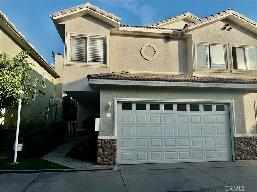Welcome home to this spacious **4-bedroom, 3-bath townhouse** located in a secure, gated community in Reseda, it truly lives like a single-family home. With **1,739 sq. ft.** of living space, this turnkey property is ready for you to move right in.

The kitchen opens seamlessly to a large living room featuring a cozy fireplace, smooth modern ceilings, recessed lighting, and a sliding door that leads to your **own private patio**, perfect for relaxing or entertaining.

The oversized primary suite is a standout, offering high ceilings, recessed lighting, a walk-in closet, and a beautifully updated bathroom with a double-sink vanity, shower, and soaking tub. Three additional well-sized bedrooms and two full bathrooms provide plenty of space for family, guests, or a home office setup.

Additional highlights include a **separate laundry room**, an **attached 2-car garage with direct access**, and **fresh paint throughout**. The community features a large swimming pool and spa, great for unwinding or hosting friends.

Conveniently located close to shopping, restaurants (within walking distance), and easy freeway access.
**Available now and ready for immediate move-in.**