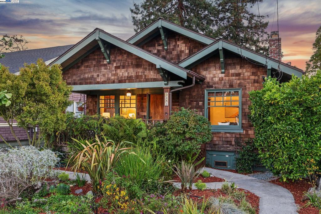 Situated on a tree-lined street in the sought-after East End neighborhood, this 1907 brown shingle Craftsman has curb appeal, charm and a prime location! The 2-level home is unusually spacious for a vintage Craftsman cottage (1,822 SF), and features 4 BR, 2BA, formal living and dining rooms, plus a large, beautifully remodeled kitchen/breakfast room. The exterior has loads of vintage Craftsman cottage appeal complemented by multiple roof lines, a curated mature garden and a wide front sitting porch, while the interior is a blend of early 20th century architectural details w/thoughtful 21st century additions and conveniences. Original details include hardwood floors, a box beam DR ceiling, Douglas fir door and window trim, built-in bookcases, a china cabinet/sideboard and an impressive brick/stone fireplace with wood stove insert. The large, remodeled kitchen is a cook's dream, fitted w/granite counters, abundant custom cabinets + kitchen storage. Both the kitchen & primary bedroom have sliding doors that open to a spacious backyard deck for entertaining or relaxing. Located just 2 blocks to Lincoln Park/pool and the San Leandro Bay shoreline, the home is close to Encinal Market, Edison Elementary & Lincoln Middle schools. A wonderful home in a sought-after Alameda neighborhood!