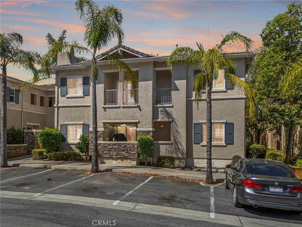 Welcome to 26390 Arboretum Way, Unit 3004 in the highly-sought after, gated community of Verona! This 2 bed, 2 bath upstairs condo is ready for a new owner! Fresh paint and new flooring! Upon entering the home, you will be greeted by a spacious living area. This home features gorgeous luxury vinyl plank and carpet throughout. This kitchen boasts beautiful white cabinets with tons of storage and opens to the living and dining area. Down the hall, you will find both spacious bedrooms and bathrooms. One bathroom features a glass enclosed walk in shower and the other features a clean shower/tub combo. This unit comes with in unit laundry and a single car garage. The Verona community features resort style amenities with a pool, spa, outdoor cooking area, and a security gate for the ultimate privacy!