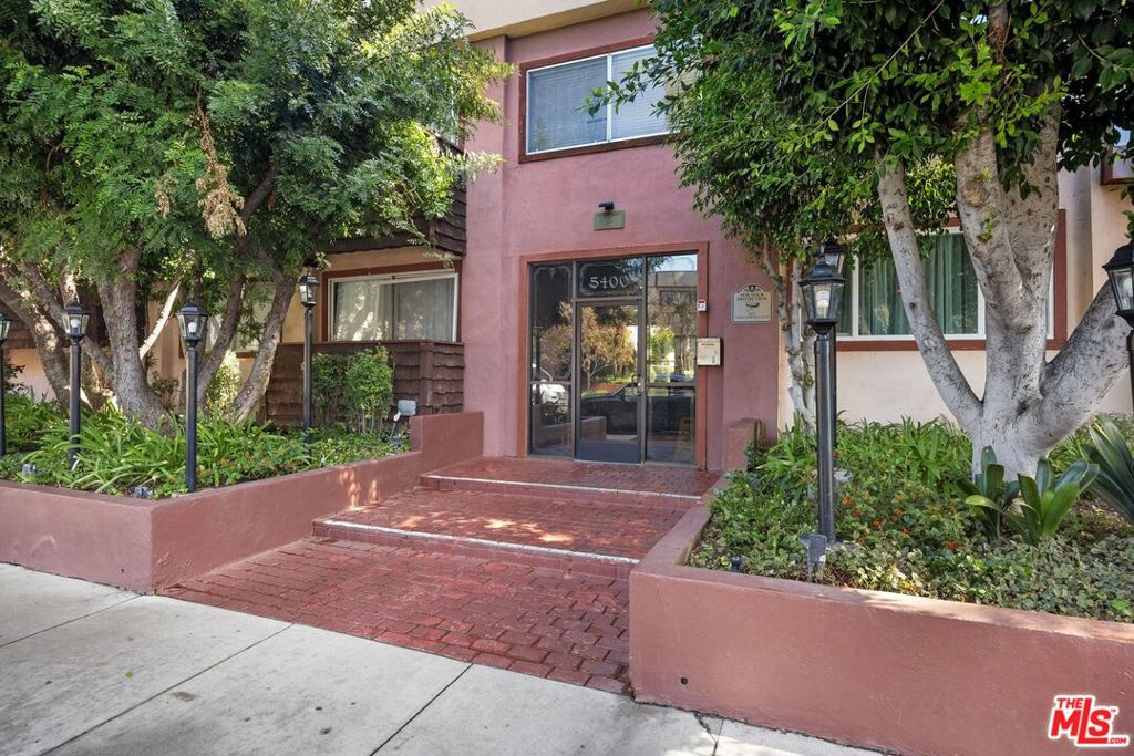 Rare opportunity, and full of potential - Welcome to your peaceful hideaway in the heart of Encino. This top-floor unit offers generous natural light and sky views within a lush, resort-style community just moments from Ventura Boulevard's shops, restaurants, and entertainment. The unit features a walk-in closet, fresh paint and carpeting in the bedrooms, and newer central HVAC and water heater. This home is perfect for buyers looking to add their personal touch. Enjoy secure, controlled-access living with amenities including a sparkling pool, spa, BBQ area, gym, recreation room and community laundry. Two tandem parking spaces and a private storage locker are included. With easy access to the 101 and 405 freeways and located near Encino Commons, this condo is in an ideal location.